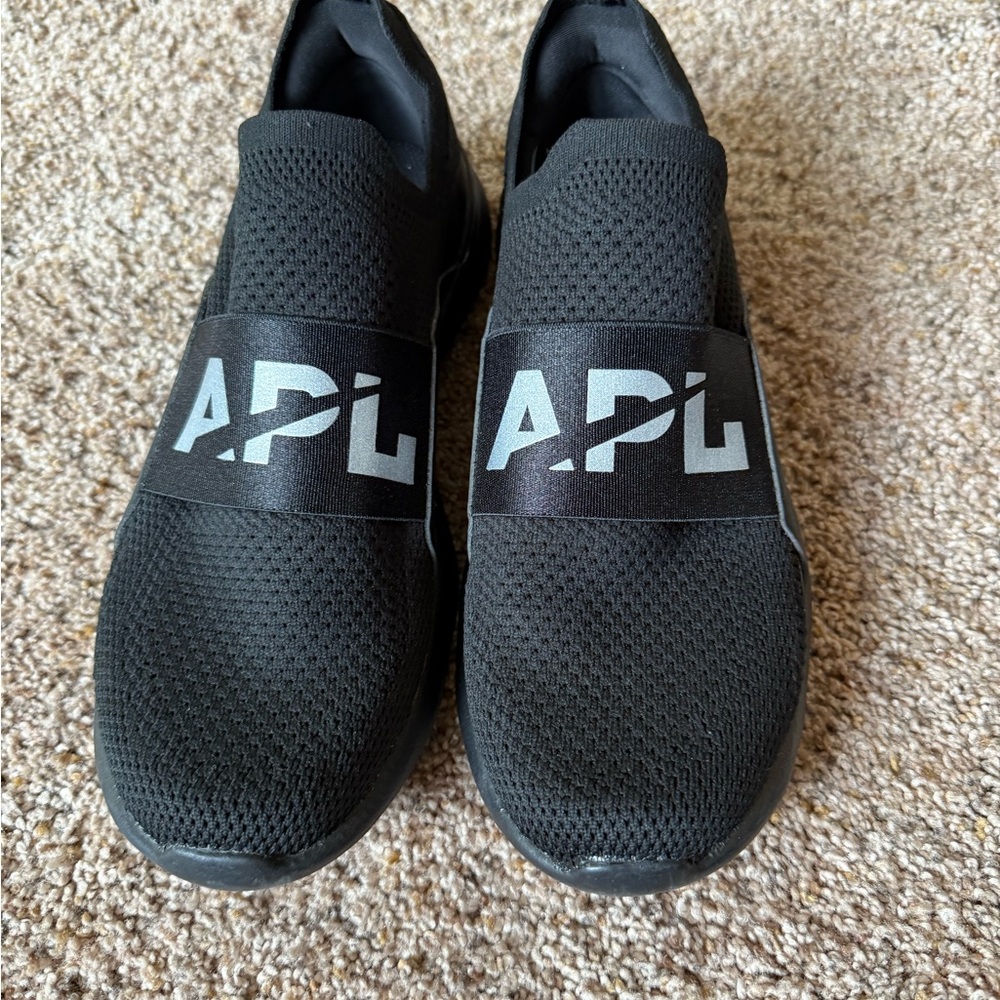 APL women’s Black Slip-On Sneakers